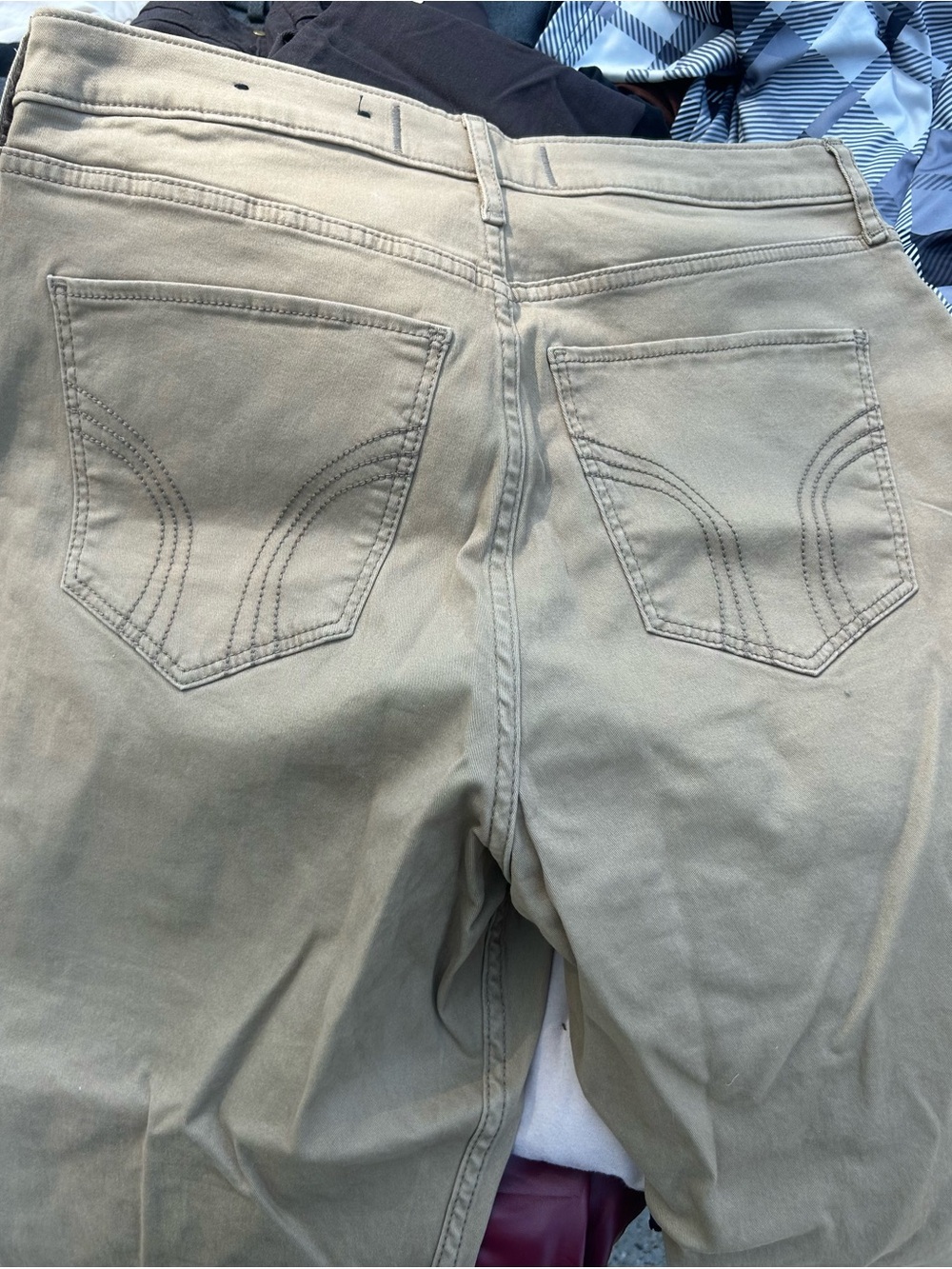 Lot of 2 gently used Hollister size 15r and 14r pants . Tan and Black